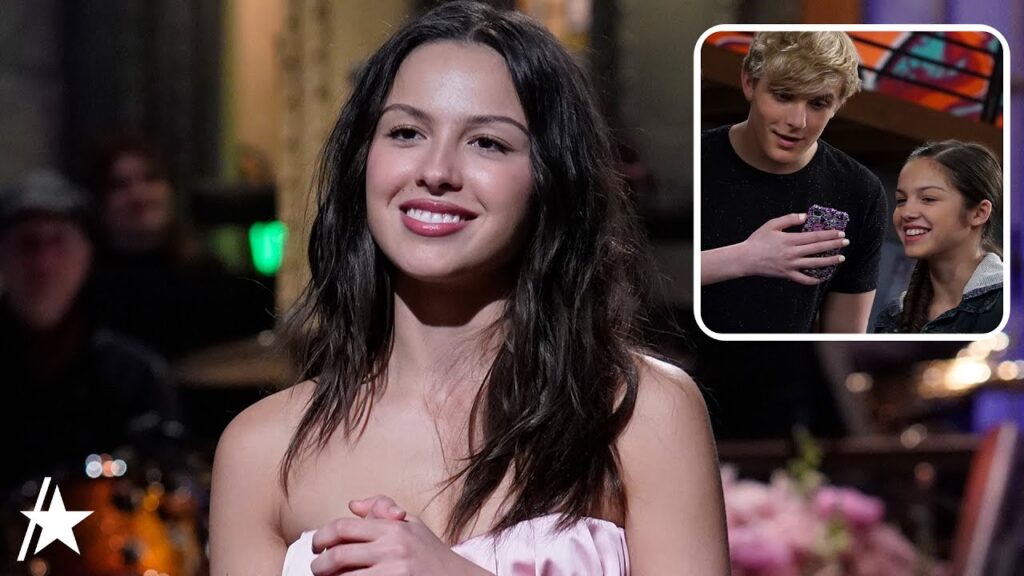 Olivia Rodrigo Jokingly Compares Career Paths w/ Former Costar Jake Paul During ‘SNL’ Hosting Debut