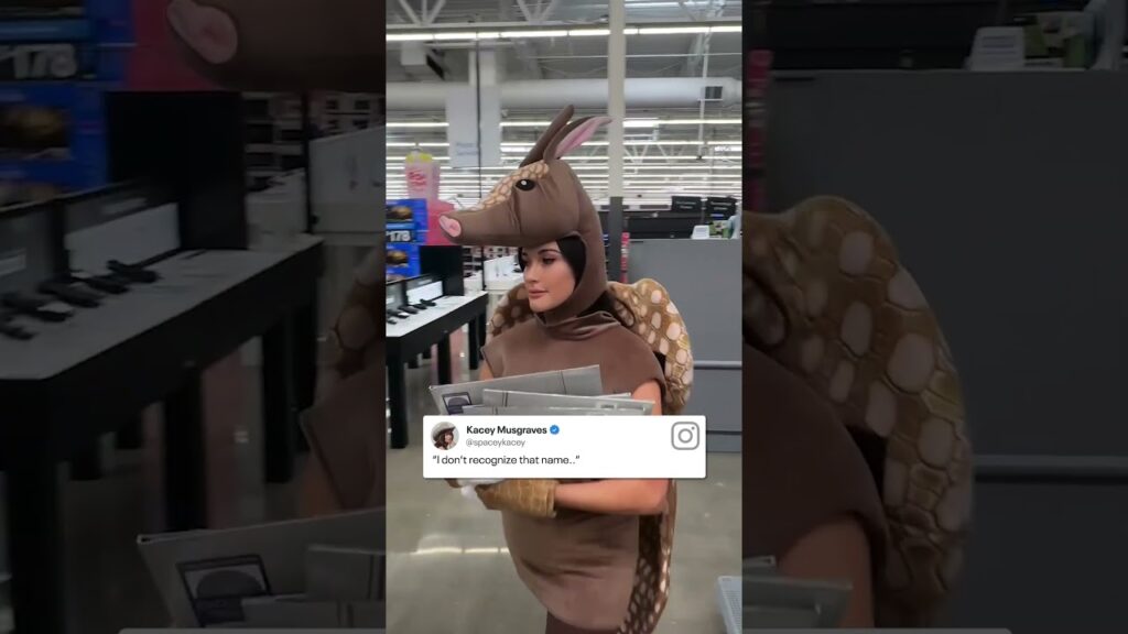 Kacey Musgraves hit the shops dressed as an armadillo to buy her new album "Middle of Nowhere."