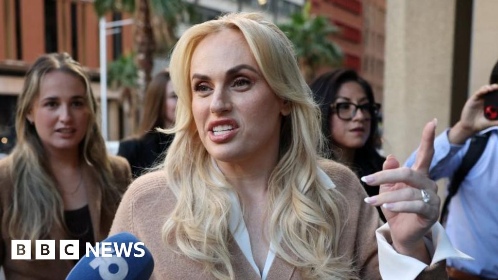 Rebel Wilson accused of 'complete revision of history' as defamation case closes - BBC