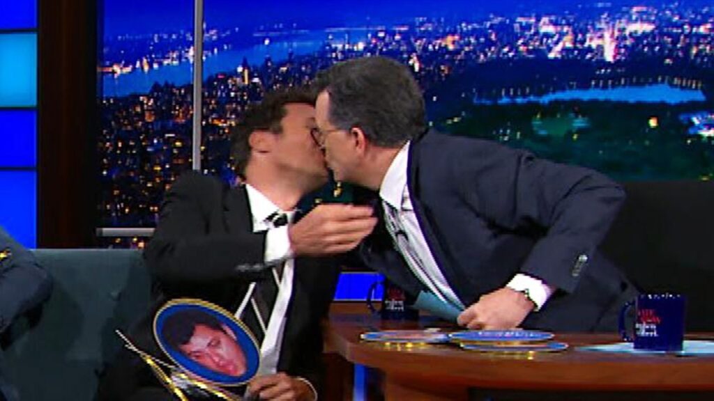 Jimmy Fallon KISSES Stephen Colbert During Late-Night Host Crossover Jimmy Fallon KISSES Stephen Colbert During Late-Night Host Crossover