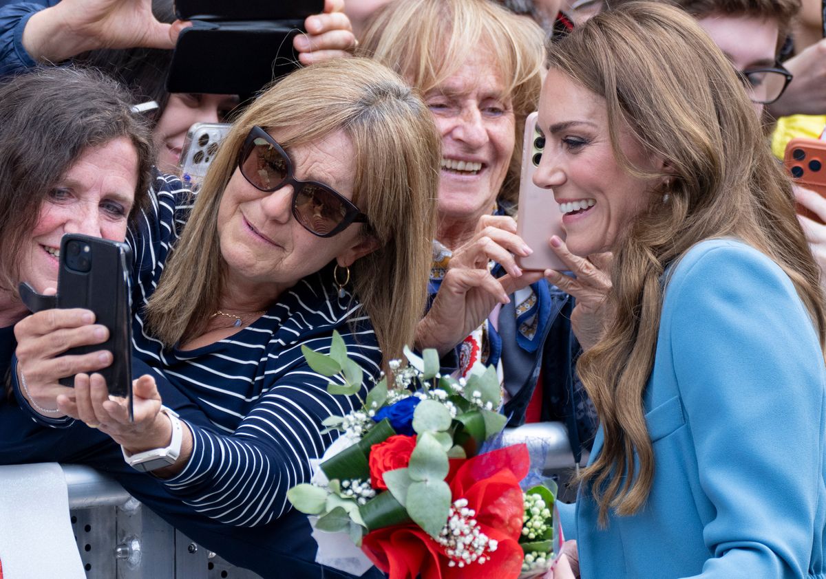 Kate poses for selfies 