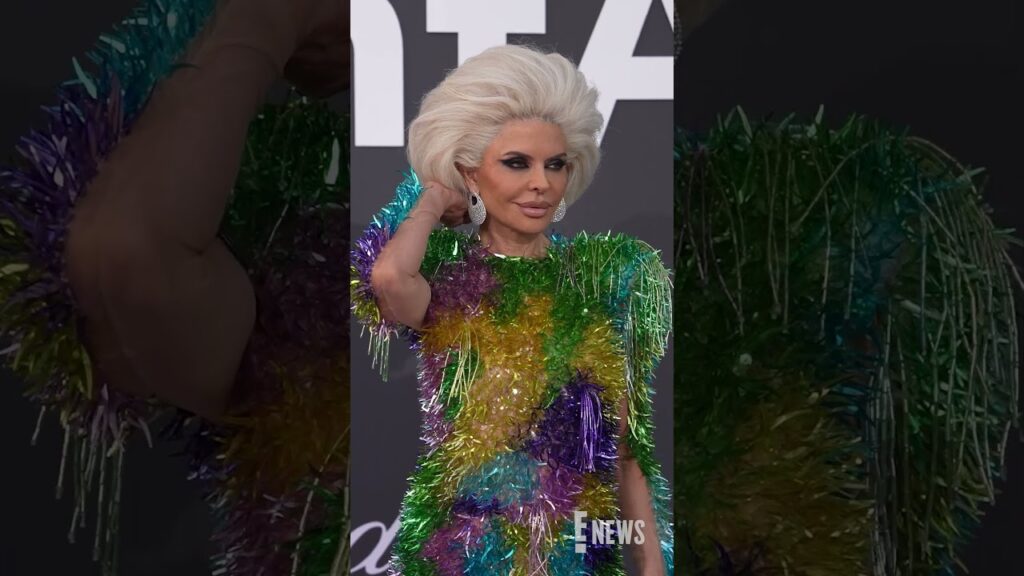 It's couture, honey. Look at the tag. 💅 Lisa Rinna is bringing the whimsy to the amfAR Gala.