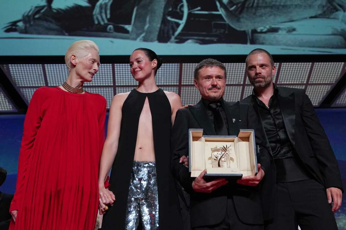 Left to right: Tilda Swinton poses with Renate Reinsve, Cristian Mungiu — winner of the Palme d'Or for Fjord — and Sebastian Stan, during the awards ceremony at the 79th Cannes international film festival, in southern France, on Saturday.