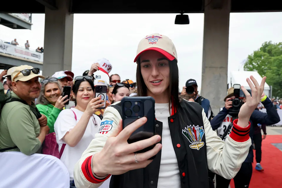 Indiana Fever guard Caitlin Clark walks the red carpet Sunday, May 24, 2026, ahead of the 110th running of the Indianapolis 500 at Indianapolis Motor Speedway.