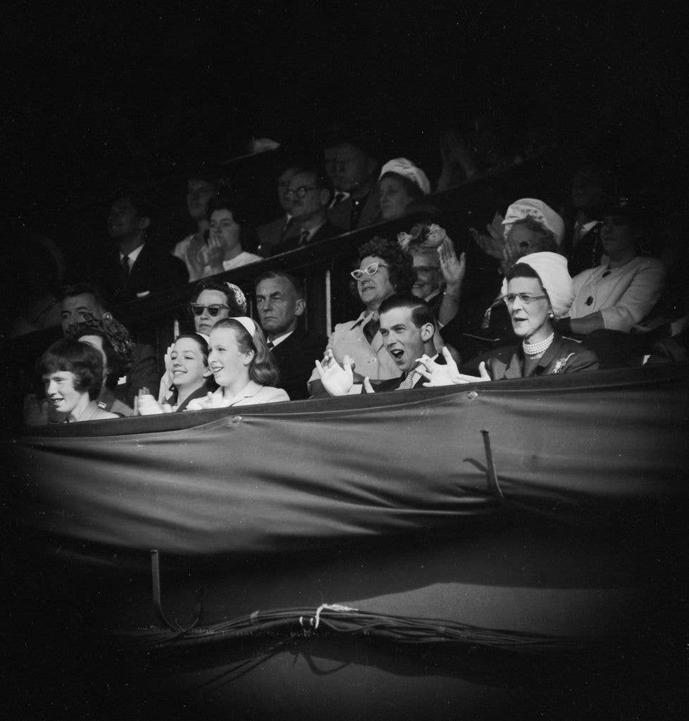 Princess Anne, Prince Michael of Kent and his mother Princess Marina show their approval from the royal box at Wimbledon