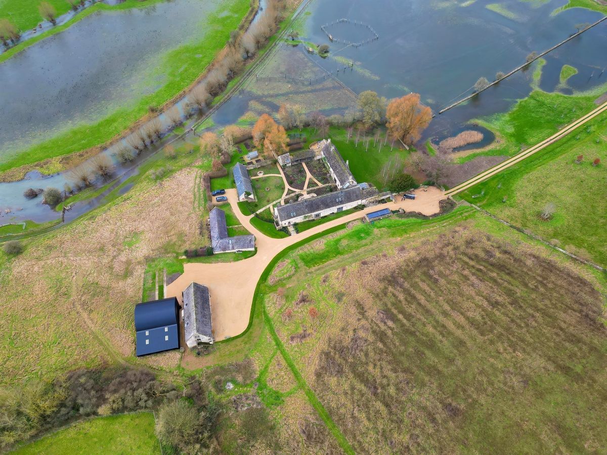 Extreme weather has seen their planned escape become a nightmare, with floodwater leaving much of the land around their 43 acre rural retreat.