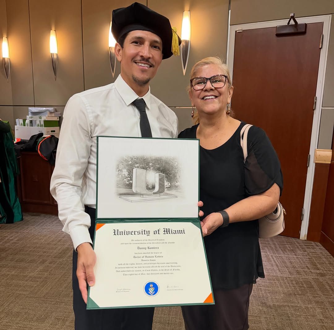 Danny Ramirez shows off his degree with his mother
