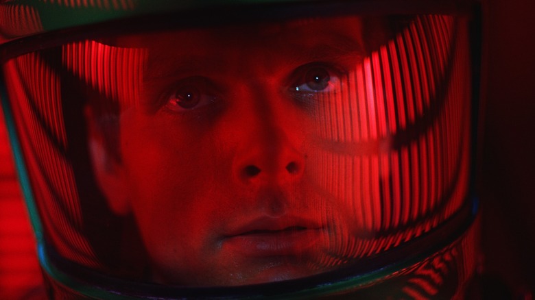Dr. David Bowman looking out through his space helmet in 