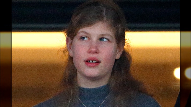 Lady Louise Windsor in a blue top at a Christmas Racing at Ascot event in late 2016