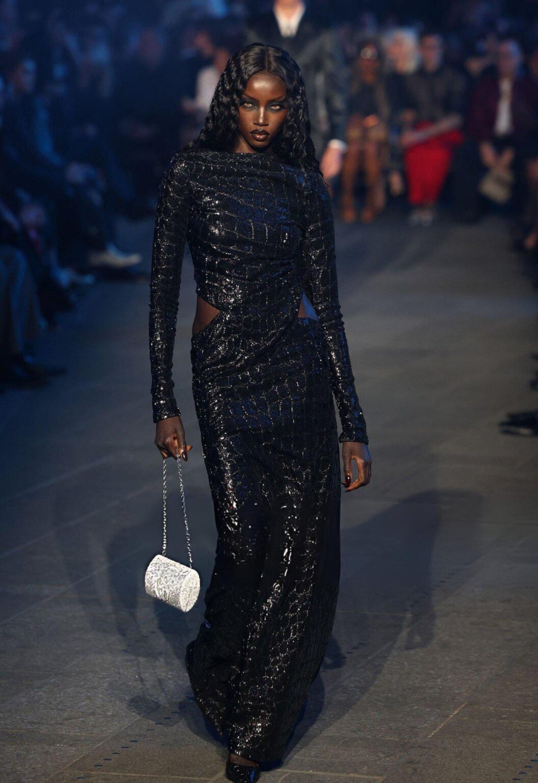 Anok Yai walks the runway during the Gucci Cruise 2027 fashion show at Times Square in New York