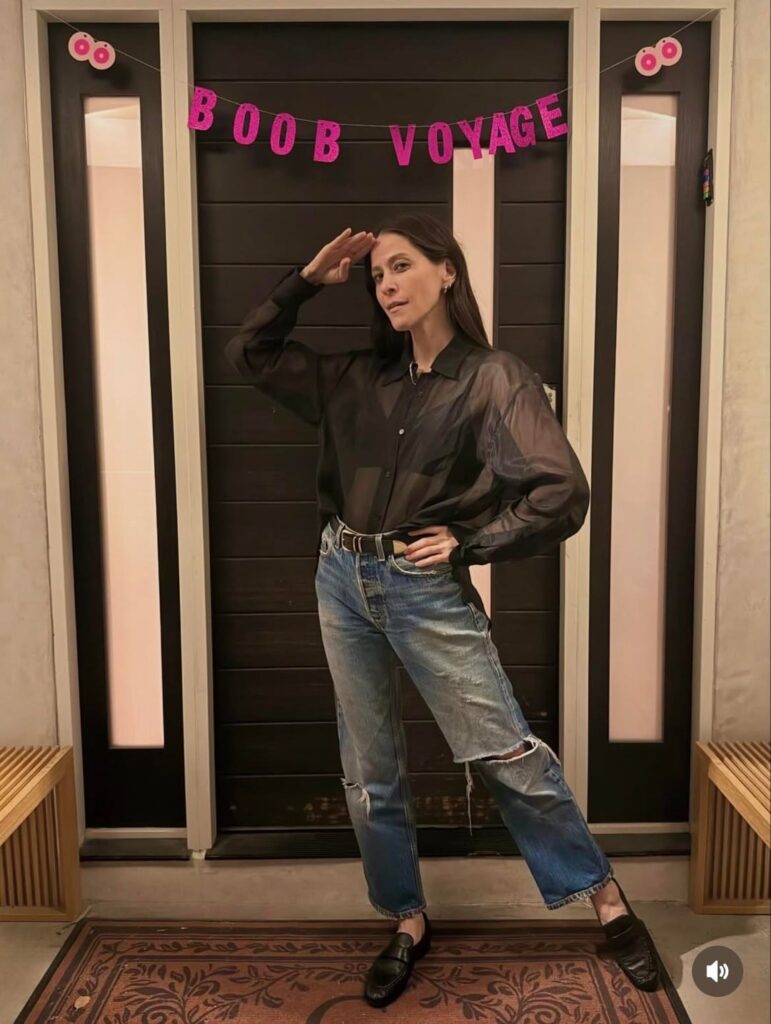 Actress Jackie Tohn Reveals She Underwent a Preventive Double Mastectomy After Testing Positive for the BRCA Gene. She Threw a "Ta Ta to Jackie's Tatas" party before the surgery.