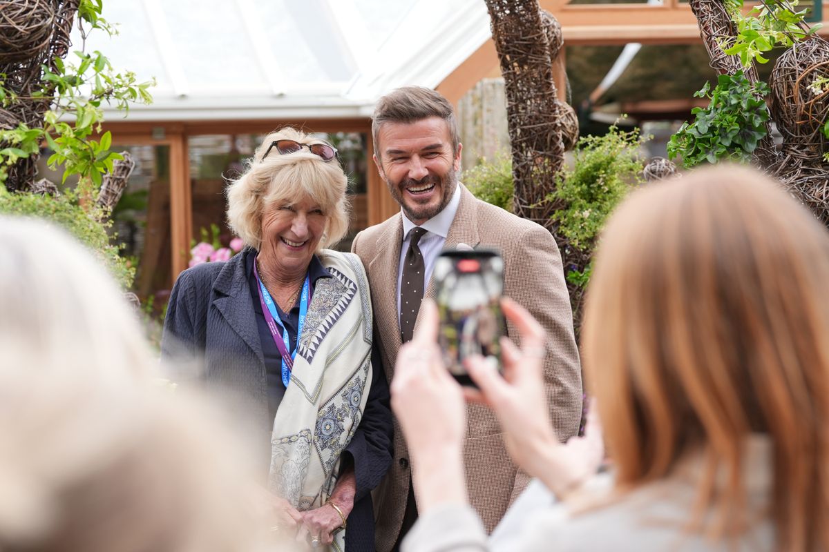 David Beckham posing with Queen Camilla's sister, Annabel Elliot