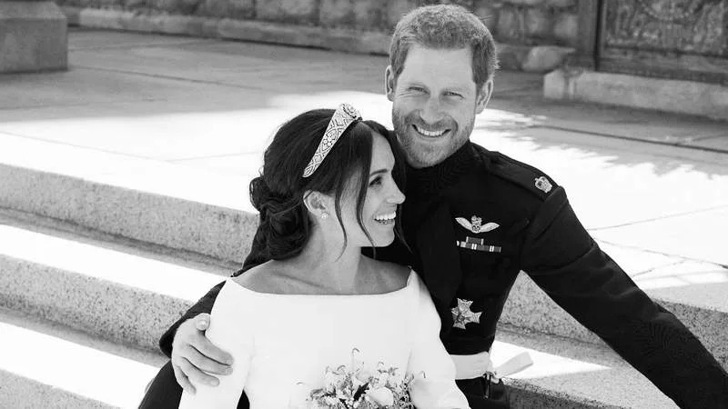 Meghan Markle and Prince Harry pose together on their wedding day in 2018. By: MEGA