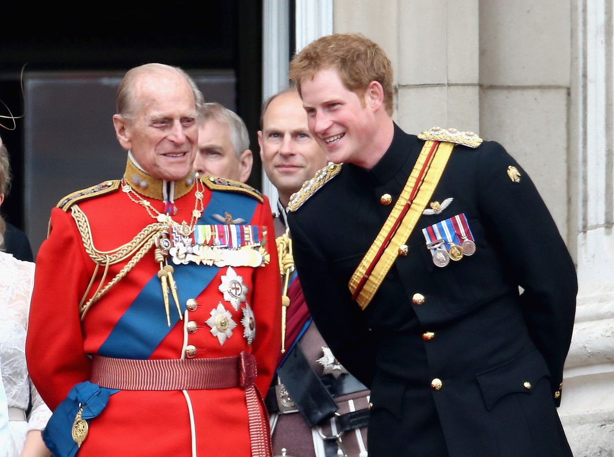 Prince Harry and Prince Philip, Duke of Edinburgh share a joke on the balcony during Trooping the Colour - Queen Elizabeth II's Birthday Parade, at The Royal Horseguards 