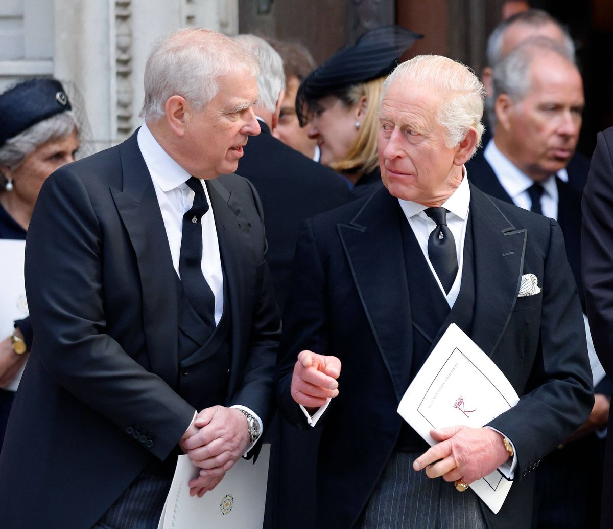 
Andrew with his older brother King Charles