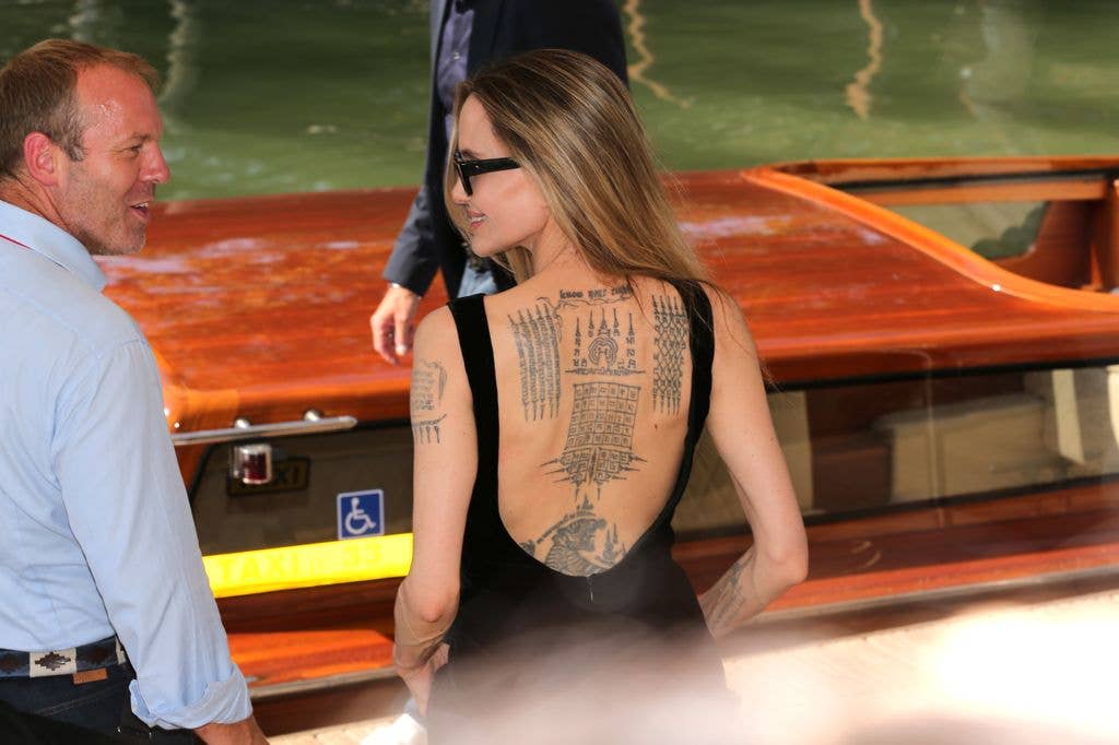 photo of angelina jolie back tattoos