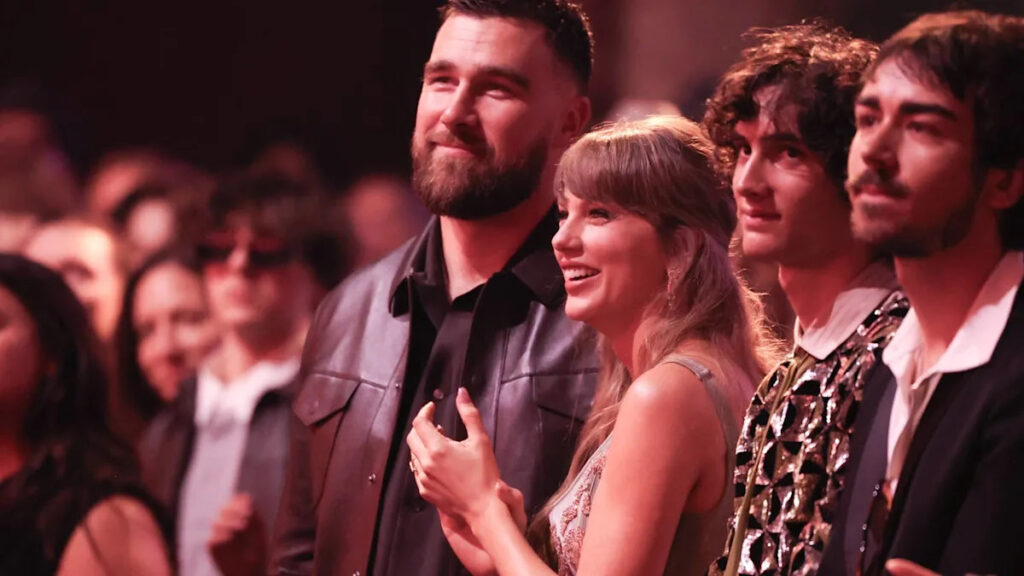 Taylor Swift Stuns in Floral Dress on Date Night, Fans Compare Look to Past Eras Taylor Swift Stuns in Floral Dress on Date Night, Fans Compare Look to Past Eras