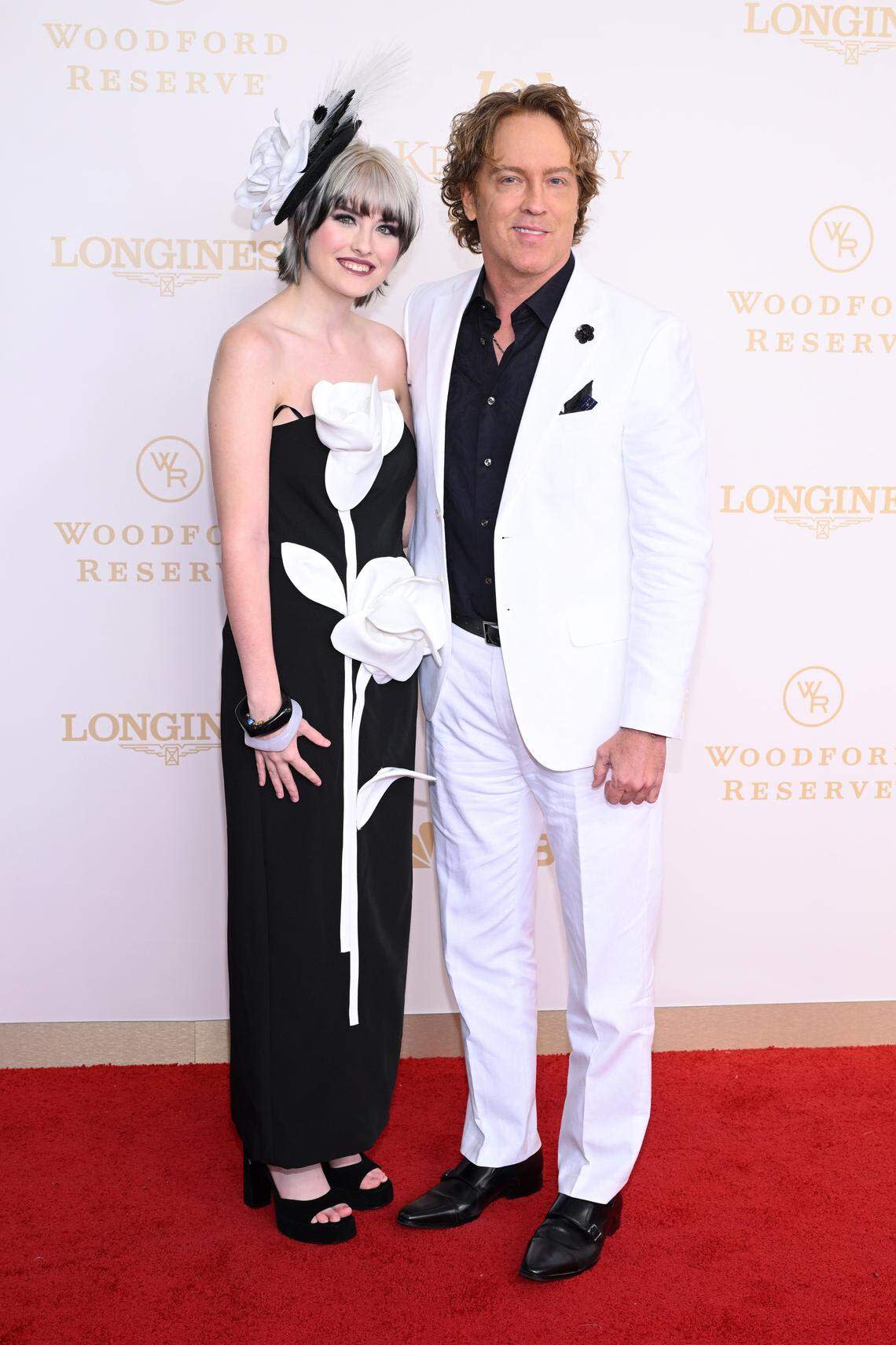 LOUISVILLE, KENTUCKY - MAY 02: (L-R) Dannielynn Birkhead and Larry Birkhead attend the Kentucky Derby 152 at Churchill Downs on May 02, 2026 in Louisville, Kentucky. 