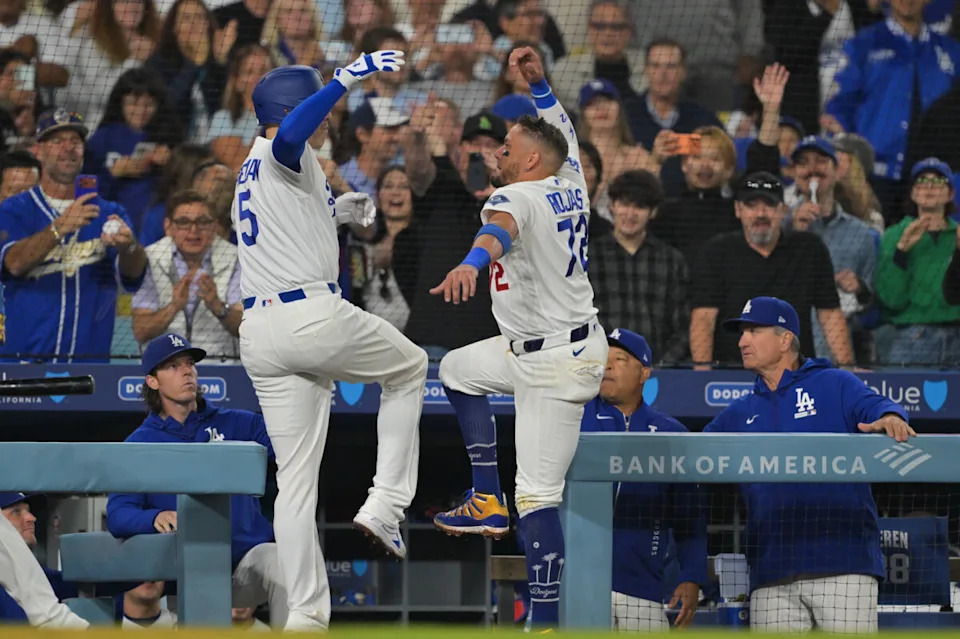 May 8, 2026; Los Angeles, California, USA; Los Angeles Dodgers first baseman Freddie Freeman (5) celebrates a solo home run with Los Angeles Dodgers shortstop Miguel Rojas (72) during the sixth inning against the Atlanta Braves at Dodger Stadium. Mandatory Credit: Jayne Kamin-Oncea-Imagn Images
