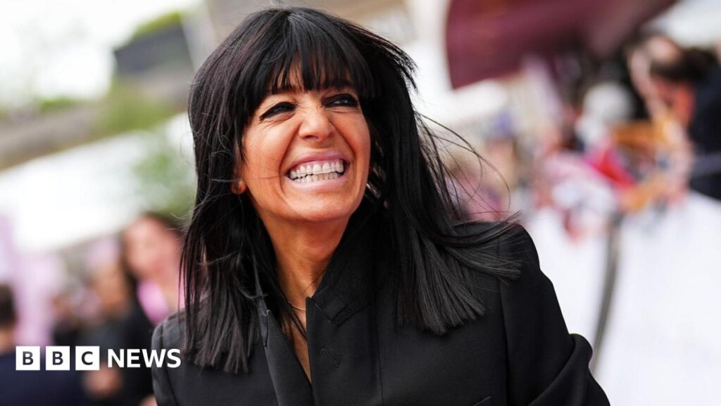 Stars walk red carpet before Bafta TV Awards ceremony – BBC Claudia Winkleman smiling and holding hands with Kris Thykier