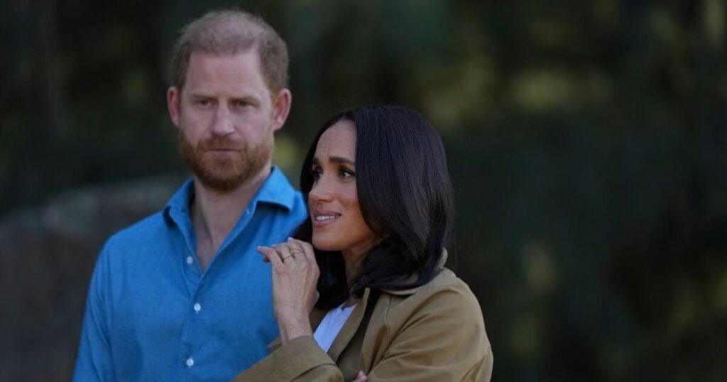 Meghan Markle and Prince Harry’s wedding photo ‘deliberately’ removed | Royal | News Meghan Markle and Prince Harry's wedding photo 'deliberately' removed | Royal | News
