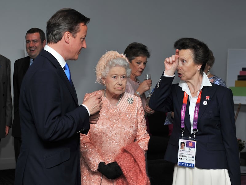 Queen Elizabeth II with the Princess Royal and Prime Minister David Cameron at the Olympic Games 2012 Opening Ceremony in London