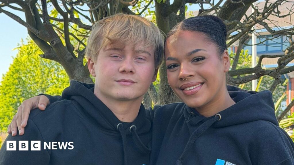 Two young people smiling wearing hoodies, Michael and Rose.