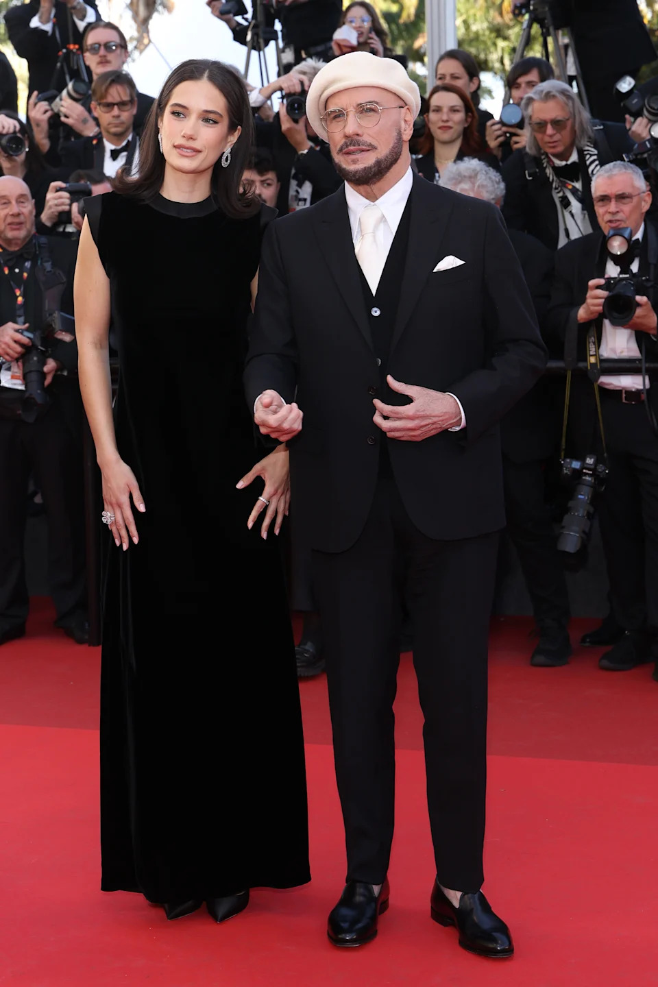CANNES, FRANCE - MAY 15: Ella Bleu Travolta and John Travolta attend the "Karma" screening during the 79th annual Cannes Film Festival at Palais des Festivals on May 15, 2026 in Cannes, France. (Photo by Pascal Le Segretain/Getty Images)