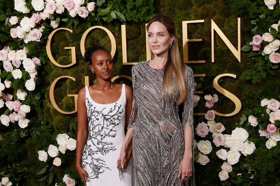 US actress Angelina Jolie (R) and her daughter Zahara Jolie arrive for the 82nd annual Golden Globe Awards at the Beverly Hilton hotel in Beverly Hills, California, on January 5, 2025.