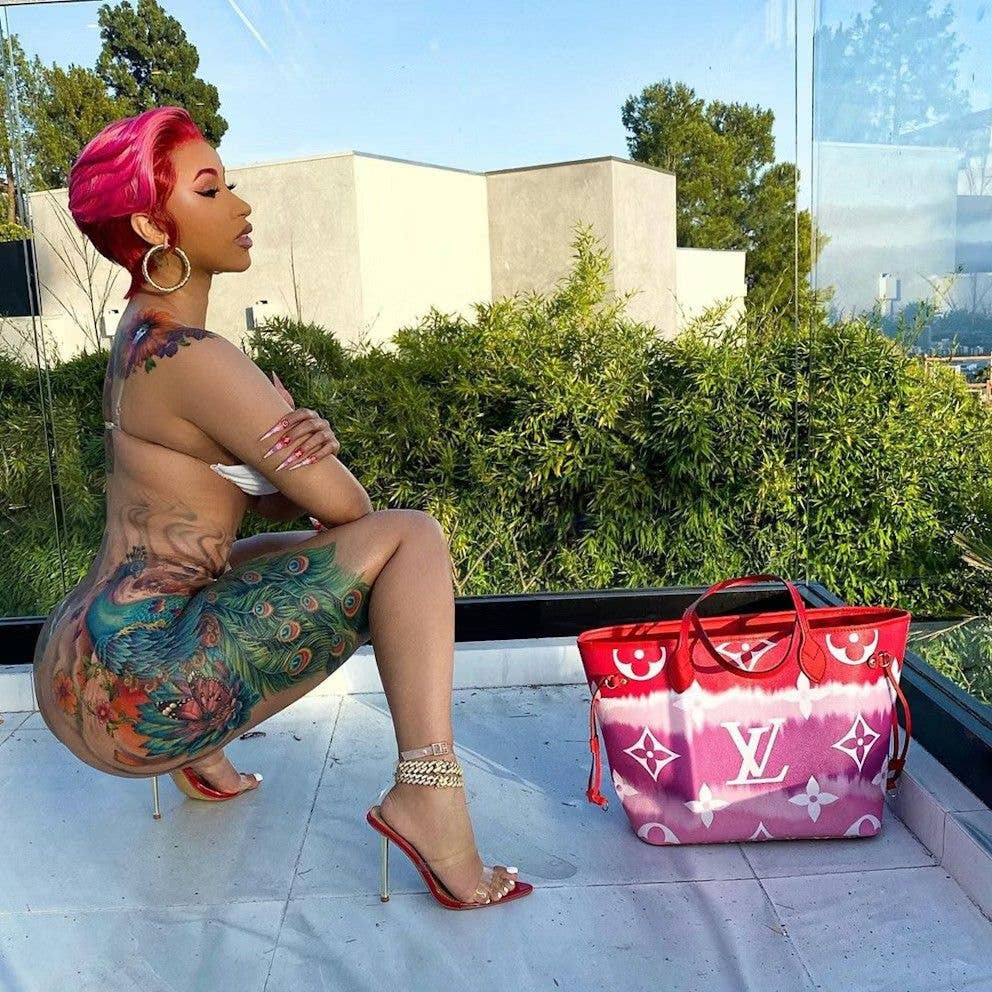 photo of cardi b's peacock tattoo