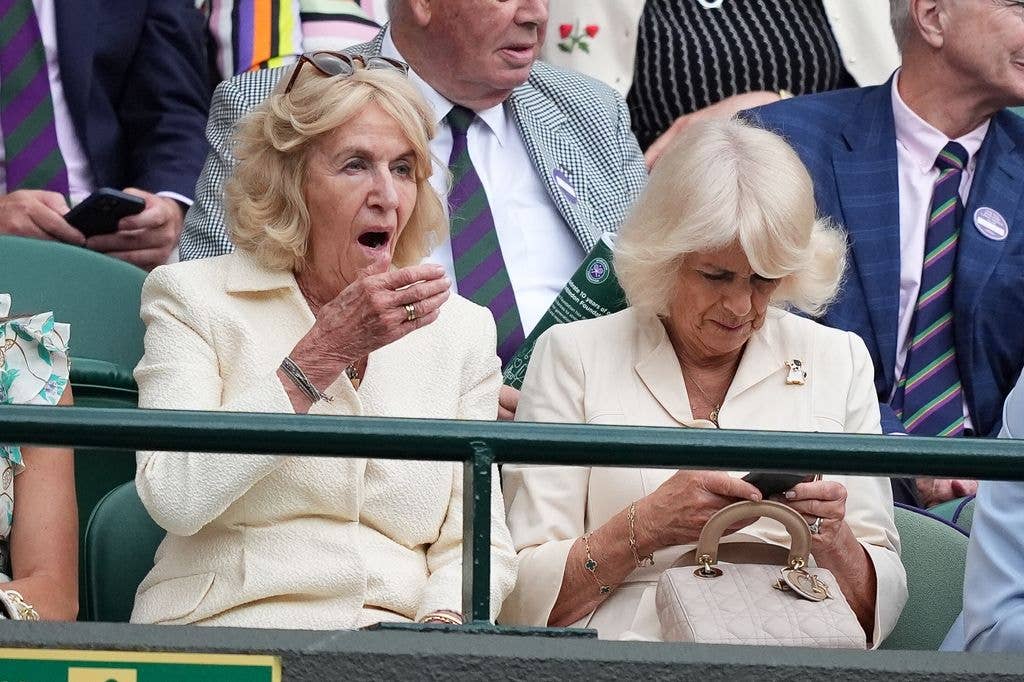 Queen Camilla sat coutside in beige dress at Wimbledon Championships 