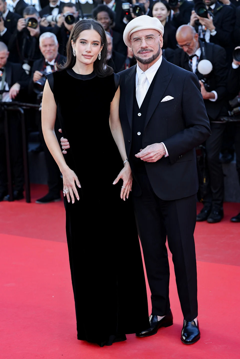CANNES, FRANCE - MAY 15: (L-R) Ella Bleu Travolta and John Travolta attend the "Karma" screening during the 79th annual Cannes Film Festival at Palais des Festivals on May 15, 2026 in Cannes, France. (Photo by Lyvans Boolaky/Getty Images)