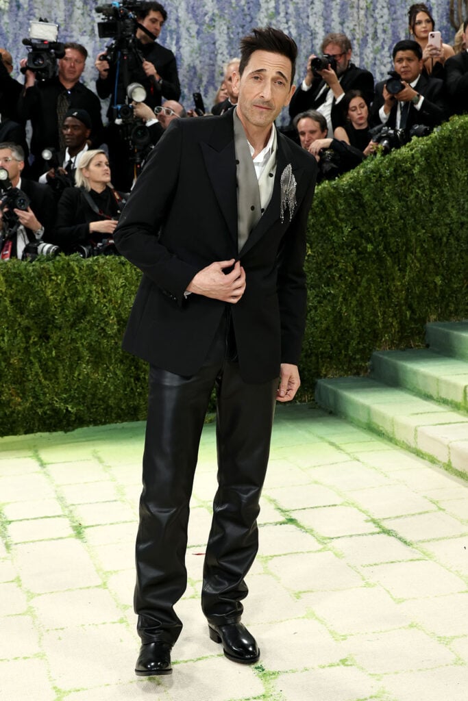 Adrien Brody wearing Dior with leather trousers at the Met Gala