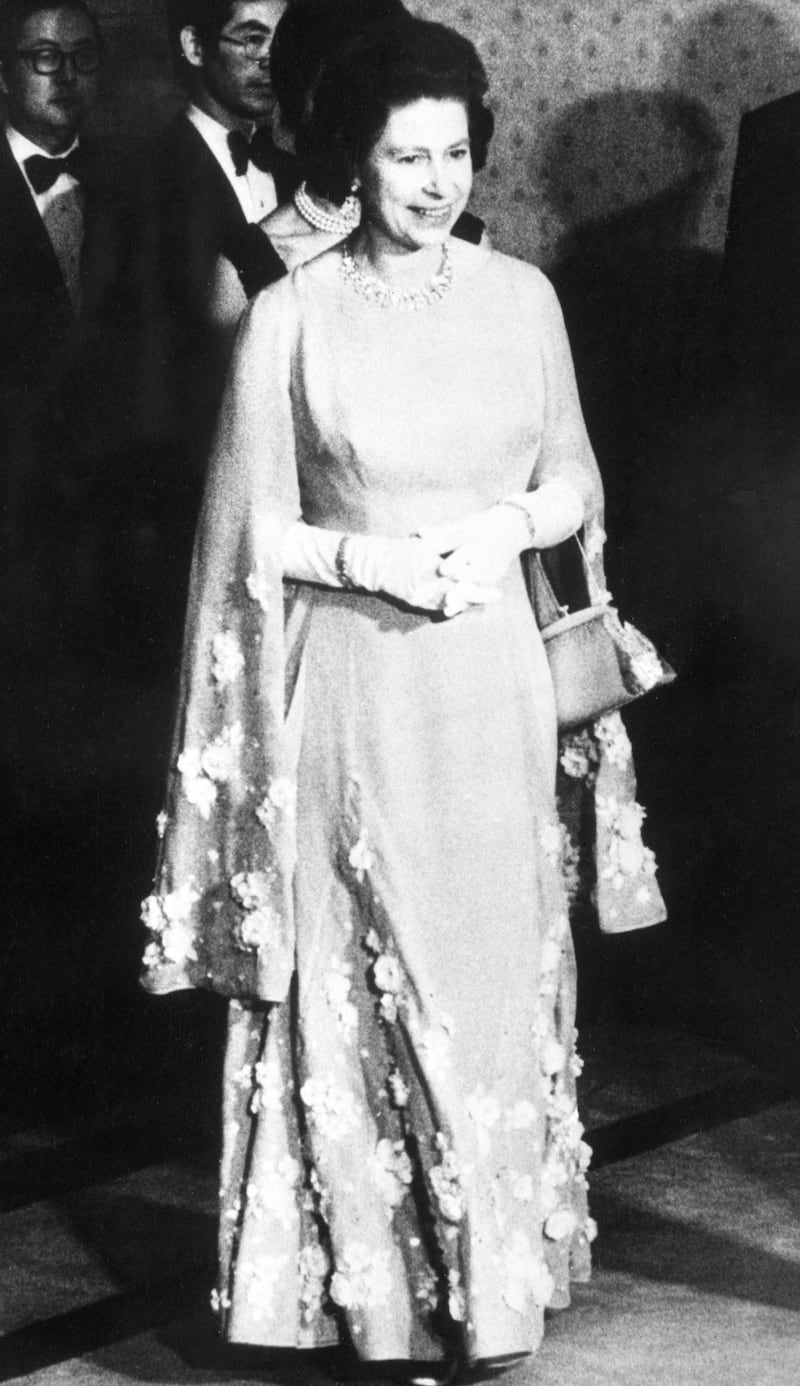 Queen Elizabeth II attending a dinner hosted by Japanese Prime Minister Takeo Miki in 1975