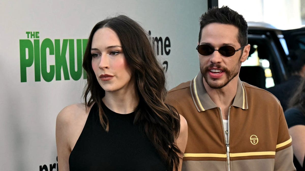 Elise Hewitt and Pete Davidson on the red carpet in 2025