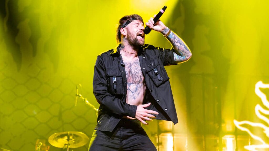 Rock Star Comes Out As ‘Proudly Gay Man,’ His Wife of 14 Years Confirms Breakup