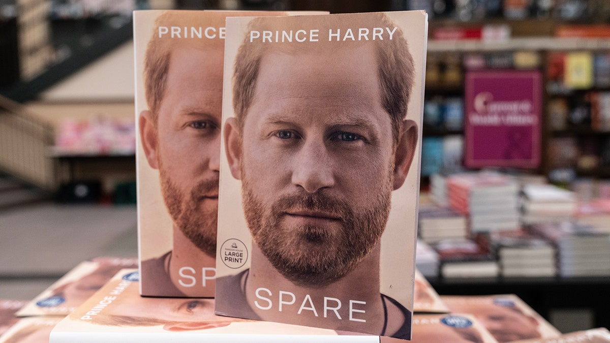 Prince Harry's book Spare displayed on a store shelf.