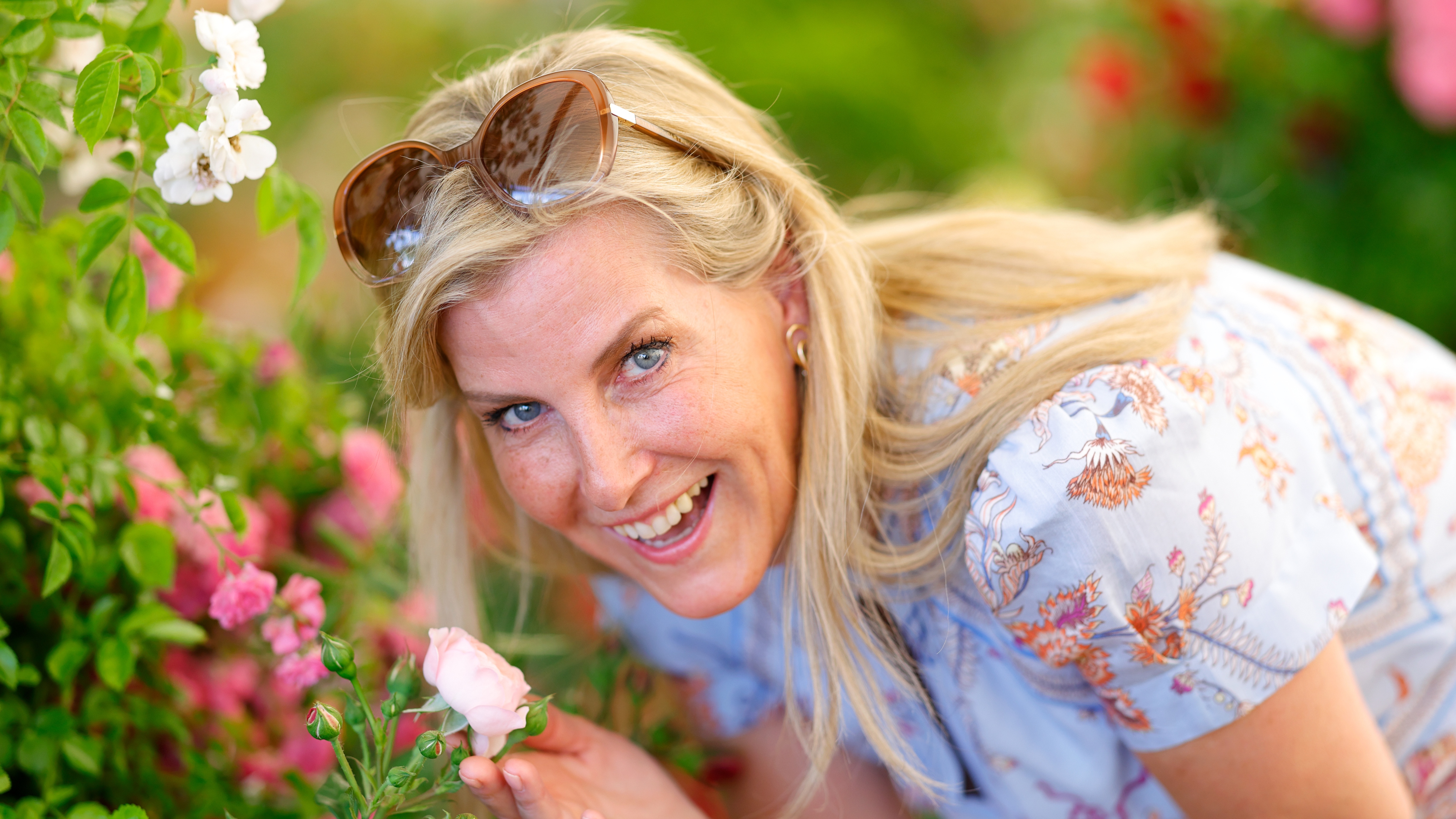 Sophie, Duchess of Edinburgh smells a display of roses as she visits the RHS Hampton Court Garden Festival at Hampton Court Palace on June 30, 2025