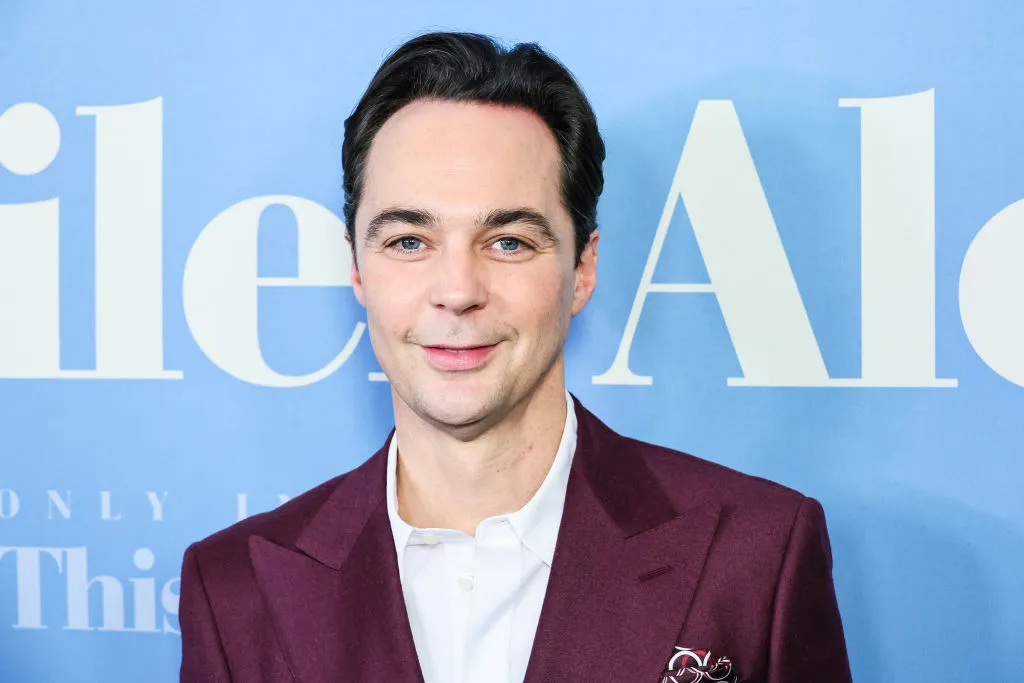 The Big Bang Theory star Jim Parsons in a burgundy suit and white shirt