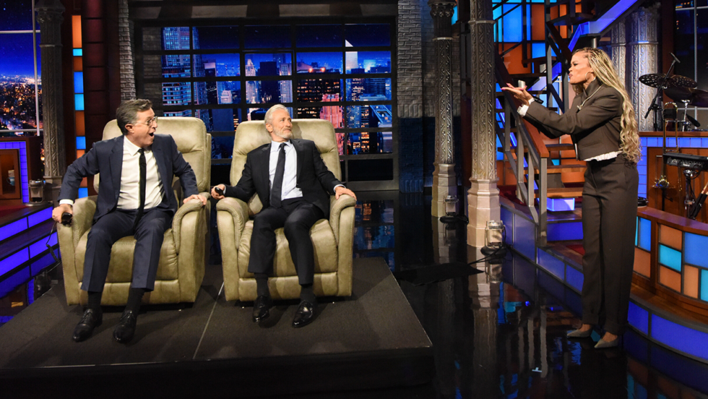 Late Show: Jon Stewart Surprises Stephen Colbert With Recliner, Andra Day Stephen Colbert, Jon Stewart and Andra Day on 'The Late Show.'