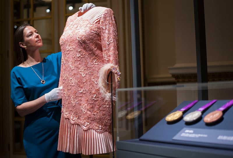 The queen’s peach cocktail dress on display in 2016