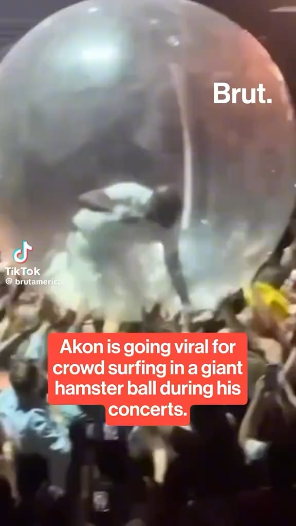 Akon is going viral for a stunt during his concerts: Crowd surfing in a giant hamster ball.