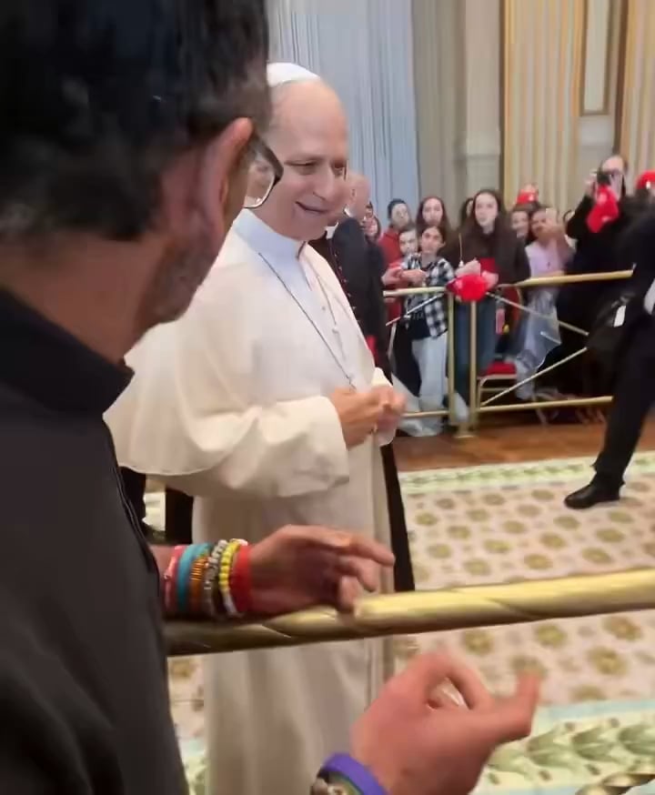 Catholic Pope Leo XIV performs "67" meme.