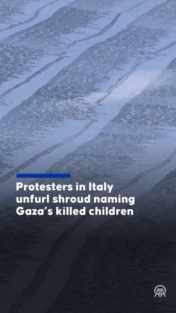 Protestors in Naples, Italy have unfurled a giant shroud bearing the names of 18,457 Palestinian children killed by Israel’s genocidal war on Gaza.