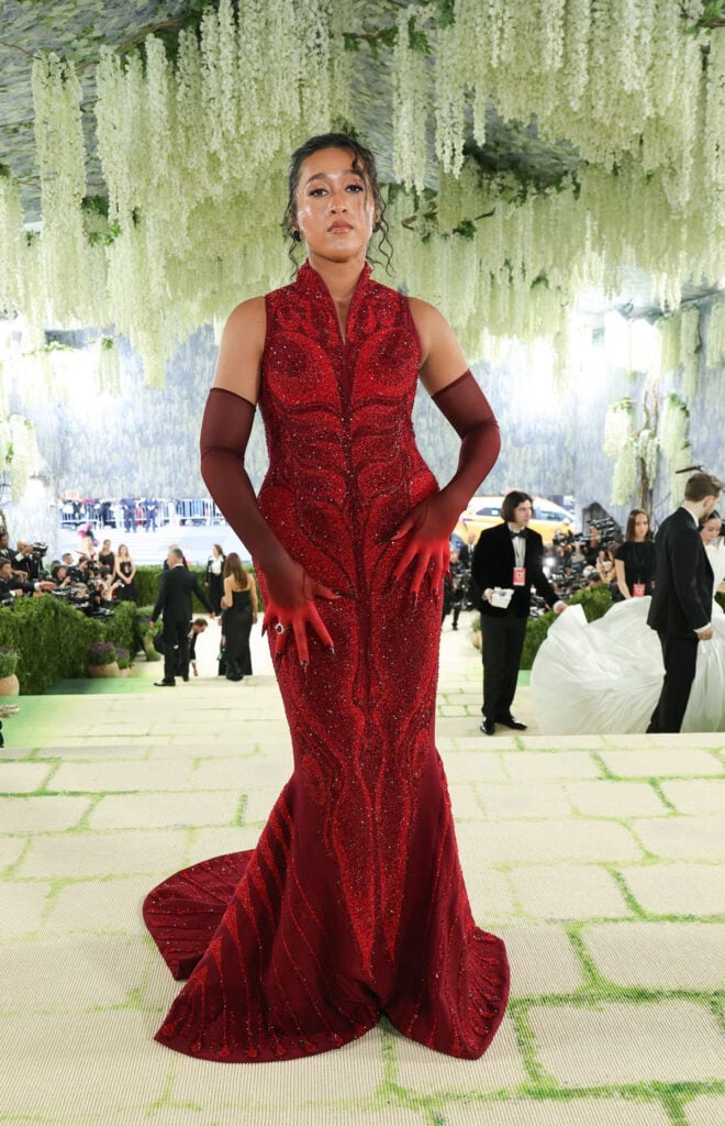 Naomi Osaka in Robert Wun Couture red anatomy dress with headpiece at the 2026 Met Gala