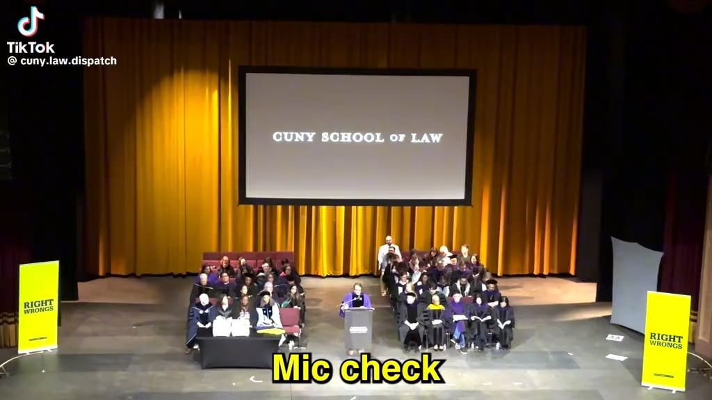CUNY Law graduates disrupt commencement, calling out CUNY's complicity in genocide and colonialism to demand divestment from Israel and solidarity with the Palestinian people