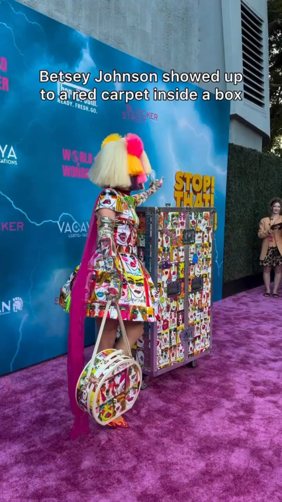 Betsey Johnson arrives on the Stop! That! Train! pink carpet in a box (May 18, 2026)