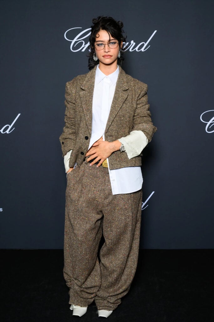 Odessa A’zion wearing Dior menswear at the 2026 Trophée Chopard Ceremony during Cannes Film Festival
