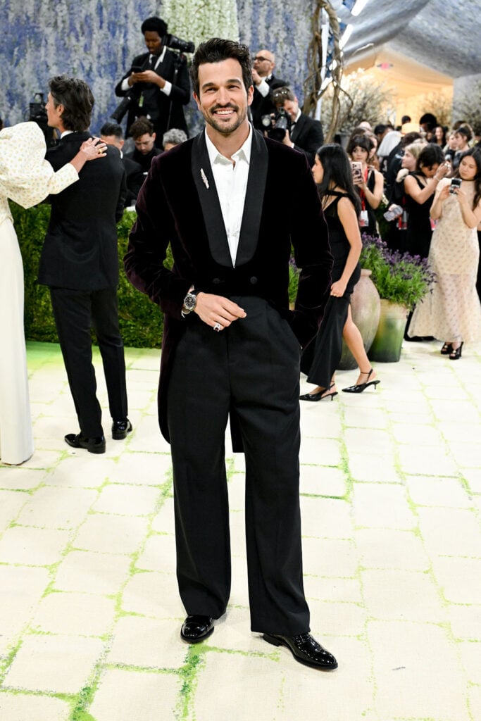 Paul Anthony Kelly wearing burgundy velvet Dior tailcoat at the Met Gala