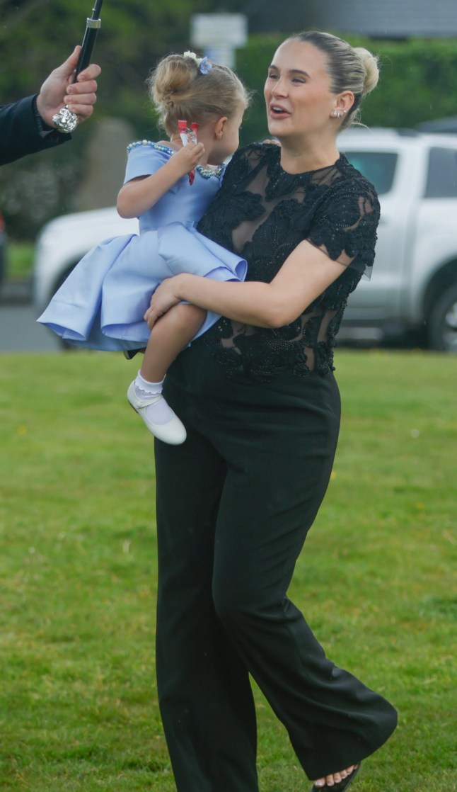 BGUK_3584413 - isle of man, UNITED KINGDOM Molly-Mae Hague was spotted with daughter Bambi at the wedding of Venezuela Fury, the 16-year-old daughter of Tyson and Paris Fury, at the Royal Chapel of St John the Baptist in the Isle of Man. The mother-daughter duo joined the star-studded guest list for the lavish ceremony. Pictured: Molly-Mae Hague, Bambi Fury BACKGRID UK 16 MAY 2026 UK: +44 208 344 2007 / uksales@backgrid.com USA: +1 310 798 9111 / usasales@backgrid.com *Pictures Containing Children Please Pixelate Face Prior To Publication*
